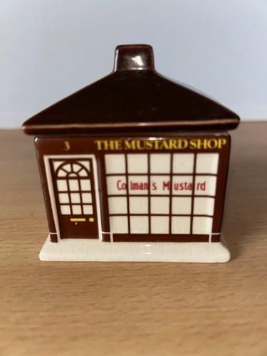 Mustard pot the shape of - mustard,