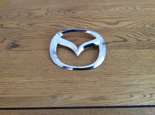 Mazda front badge - mazda,