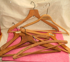 SIX VINTAGE WOODEN COAT / TROUSER HANGERS, HIGH HAT CLEANERS, GLEN EAGLE HOTEL