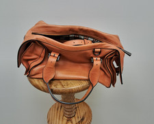 Coccinelle Leather Orange/Tan Handbag With Buckles