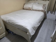 white wooden double bed frame used