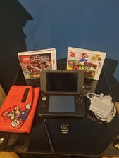 Nintendo 3DS XL Red/Black Console with Charger 2 Games Carry Case And Charger