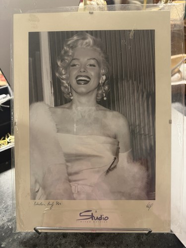 Production proof signed - 3/25,