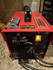 The Product Shown Is A TOOLTEC Welder Model BX-100B. It Is An AC Arc Welder