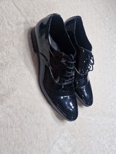 AM SHOE COMPANY Deichmann