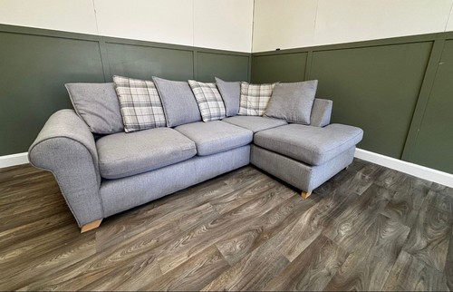 Grey corner sofa with plaid - corner,