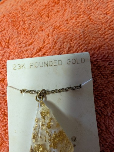 Karat gold pounded pendant - 23,