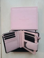Pink and black leather purse