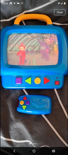 Telly tubbies with remote - tv,