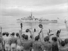 Crew of HMS Jamaica cheering