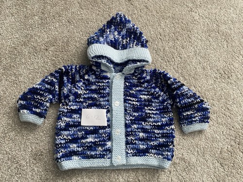 Hand knitted brand new baby - hand,