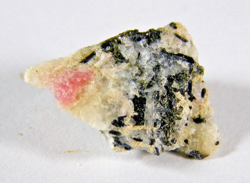 Tiny rare tugtupite piece - tugtupite,