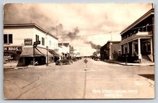 Owen Wisconsin~Main Street~Jensen Bros Drug~Hotel~Black Smoke~1920s Cars~RPPC