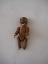 A mid brown Schuco monkey scent bottle, 1920/30th