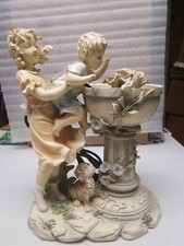 Resin girl holding boy - resin,