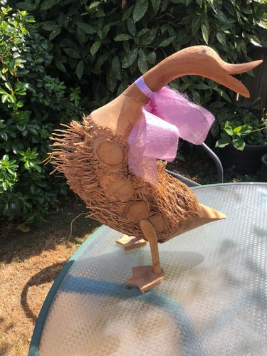 Wooden duck with - wooden,