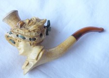 Meerschaum, a superb antique holder carved as a lady with blue ribbons