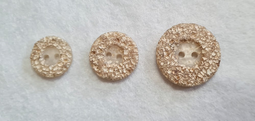 Beige stone effect buttons