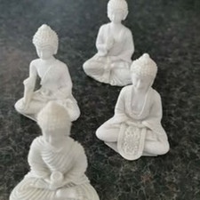 set of 4 little white buddha