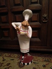 Large Resin Figerine Chef Holding A Tray of Food Cuisine On Apron.