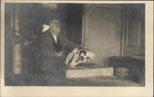 Old man butcher cutting meat - man,