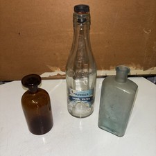 THREE OLD GLASS BOTTLES