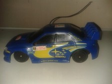 Blue Subaru Rally car. battery
