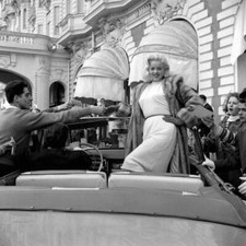 Diana Dors surrounded by