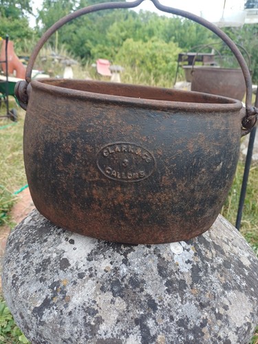 Antique cast iron clark co - cast,