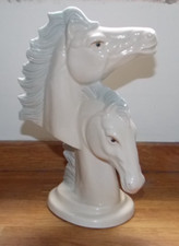 TWO WHITE/CREAM HORSES HEADS