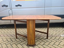 Rectangular Wooden Drop Leaf Table with Elegant Design