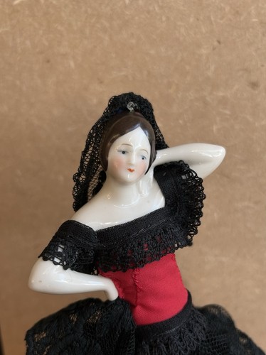 Porcelain half doll pin - half,