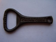 CROWN CORK OPENER. IRON BOTTLE