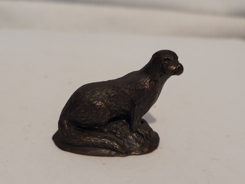 Small bronze coloured - small, resin