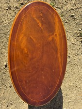 mahogany oval coffee table