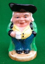 SMALL POACHER TOBY JUG.