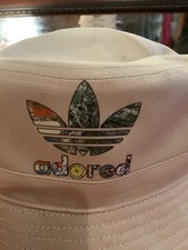 Reversible Adored bucket hat, Stone Roses summer festival Olive/cream