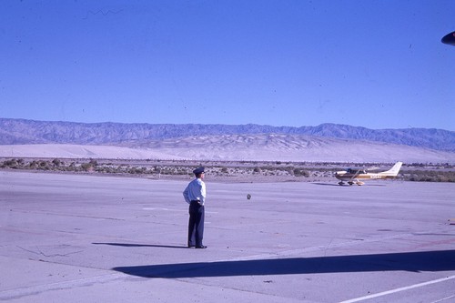 1963 pilot plane on tarmac - &,