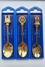 3 perfect & ornate 22 carat gold plated 2002 Jubilee spoons in the orig. boxes.