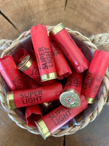 Spent shotgun cartridge cases - cartridge,