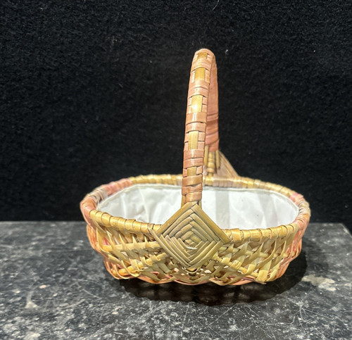 Oval shaped wicker - basket, with
