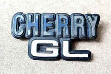 CHERRY GL CAR BADGE for a Classic DATSUN. 79894M7901 2257