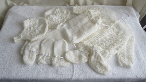 Hand knitted white - hand, 'lacy'