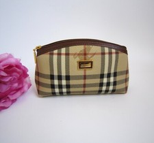 Burberry London luxury beige zipped pouch cosmetic bag.