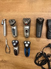 Collection of electric shavers phillishave and others plus grooming kit