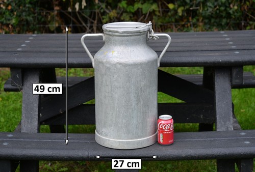 Vintage old aluminium milk