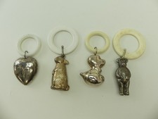 (ref288AS) 4 Antique silver plated baby rattles teethers
