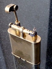Vintage 1920's 'Dunhill Unique' metal dore (gold and silver) petrol lighter