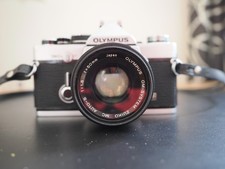 Olympus OM 2n film camera, 3 lenses, T20 flash and angle viewer