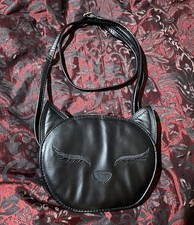 Black faux leather, cat face
